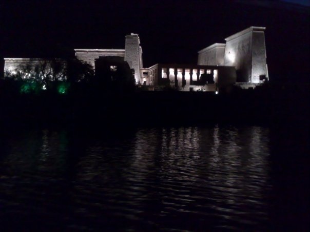 The Temple of Philae lit up at night, which we needed a boat to access